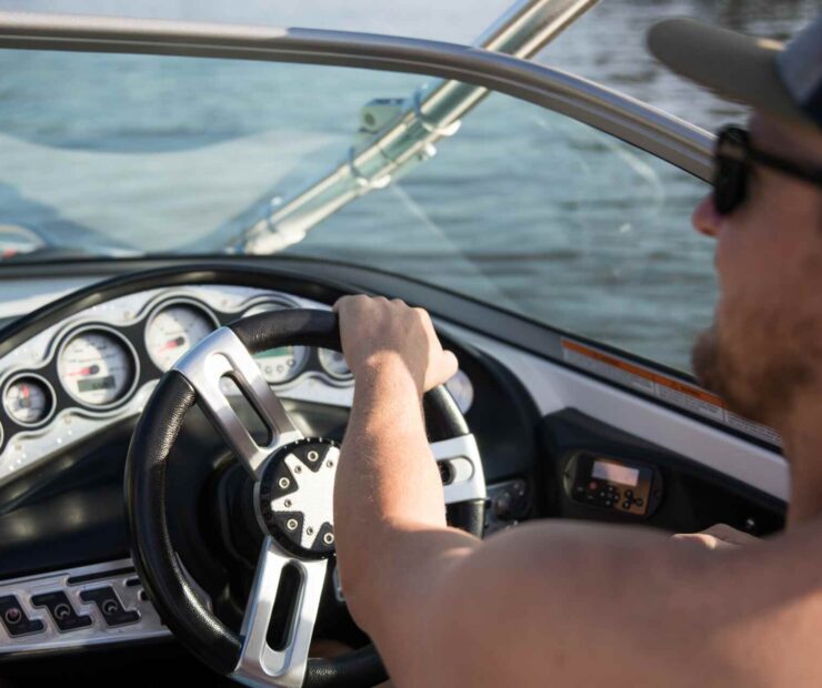 man driving a Nor-Tech boat in fort myers