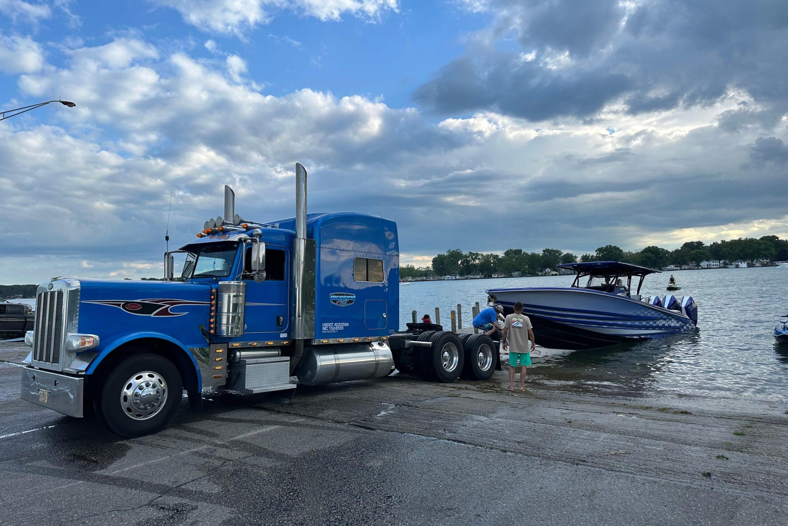 Peterbilt Unloading Nor-Tech into Lake