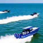 Three Sport Boats Cruising the Ocean